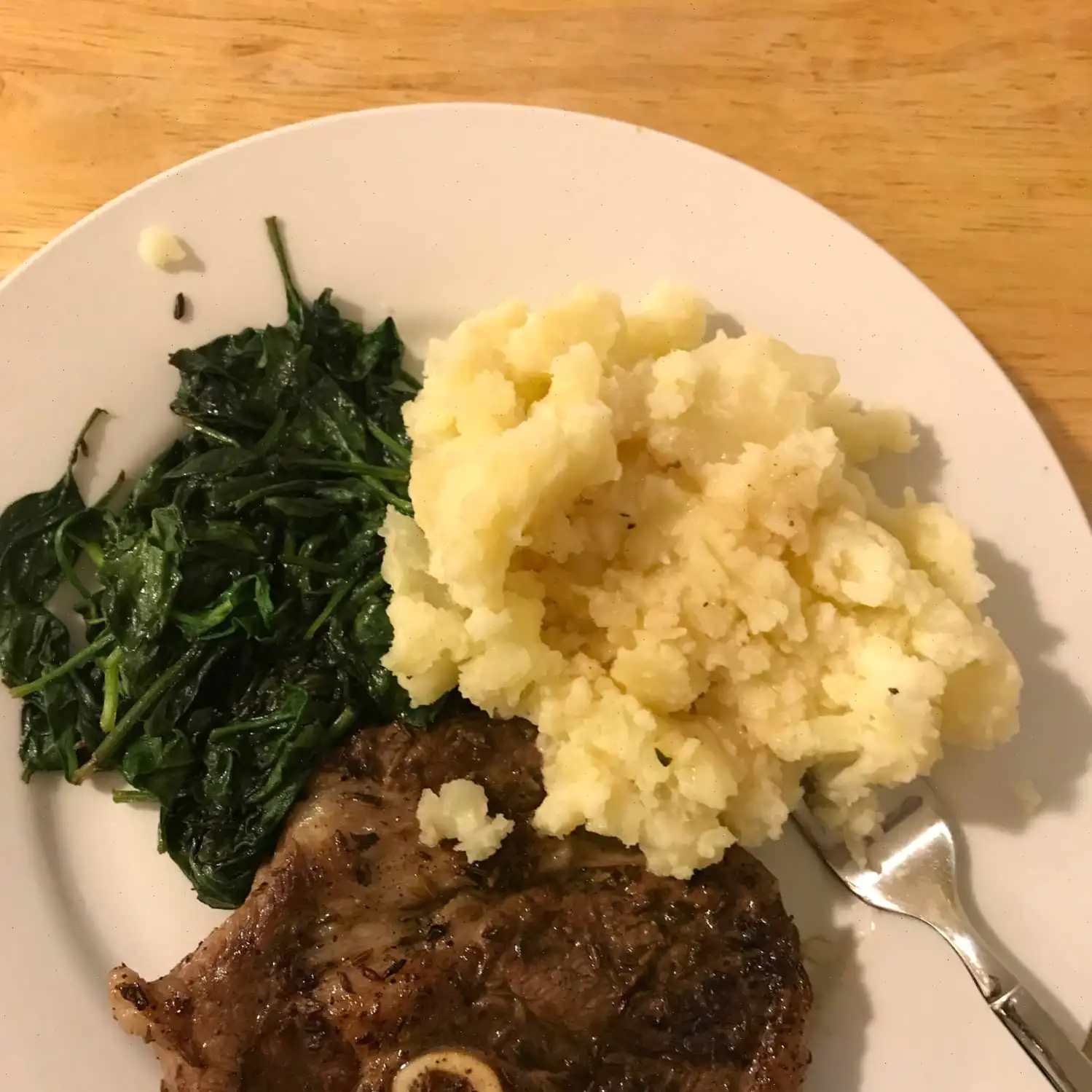 Cumin Lamb Steaks with Smashed Potatoes, Wilted Spinach and Red Wine Sauce Recipe