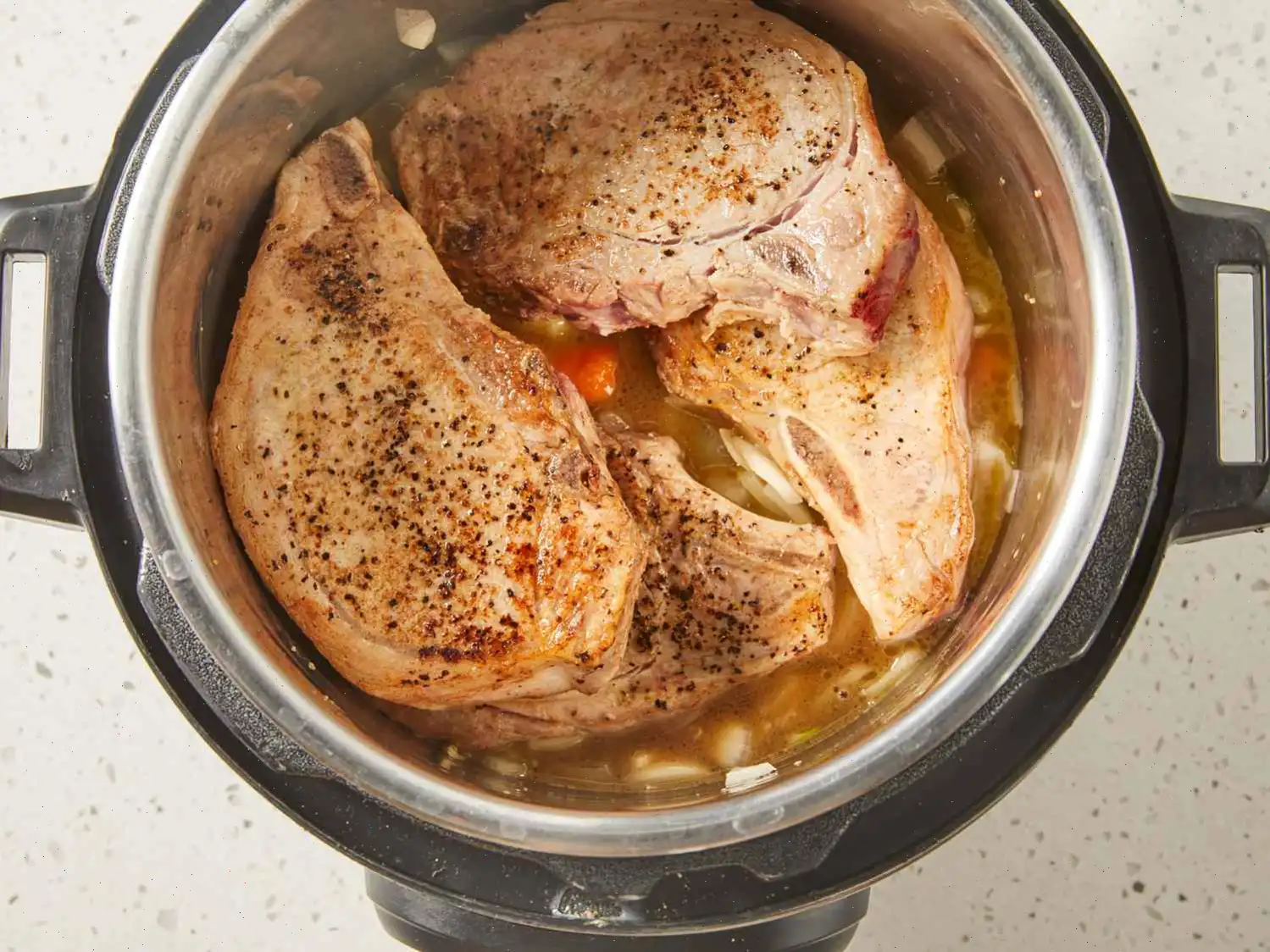 Pressure Cooker Bone-In Pork Chops, Baked Potatoes, and Carrots Recipe