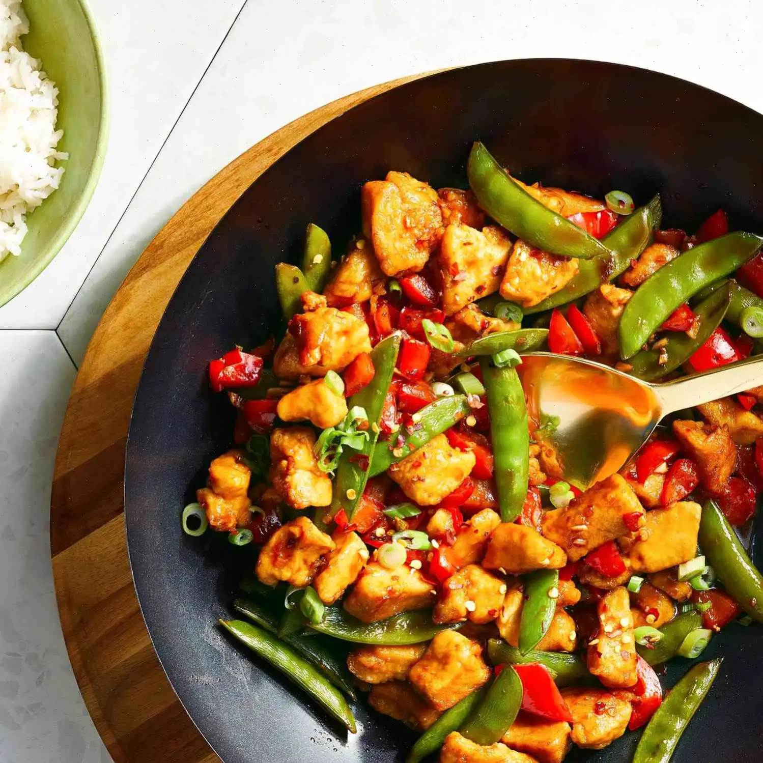 Szechuan Chicken, Peppers, and Peas on Rice Recipe