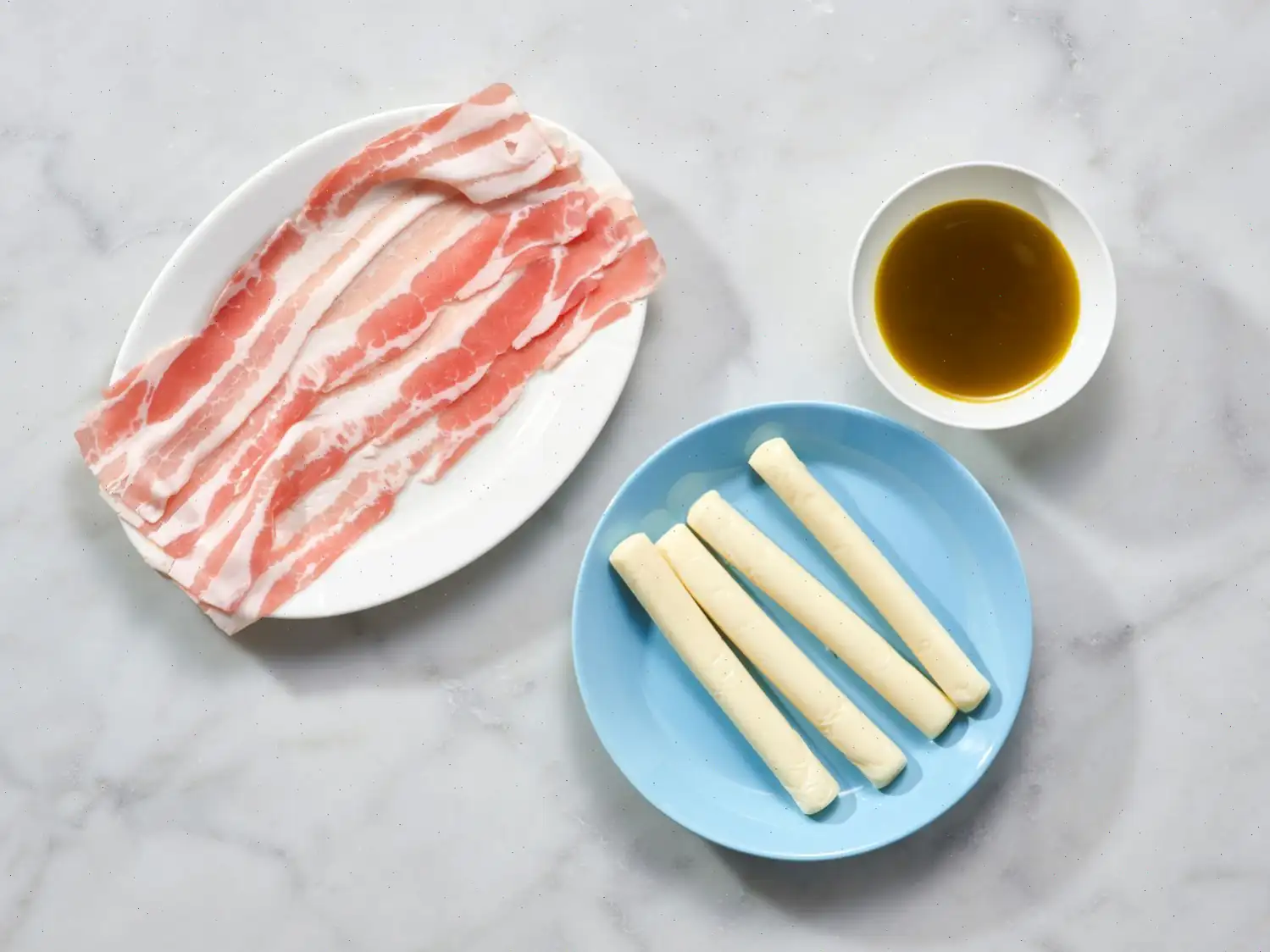 2-Ingredient Bacon-Wrapped Mozzarella Sticks Recipe