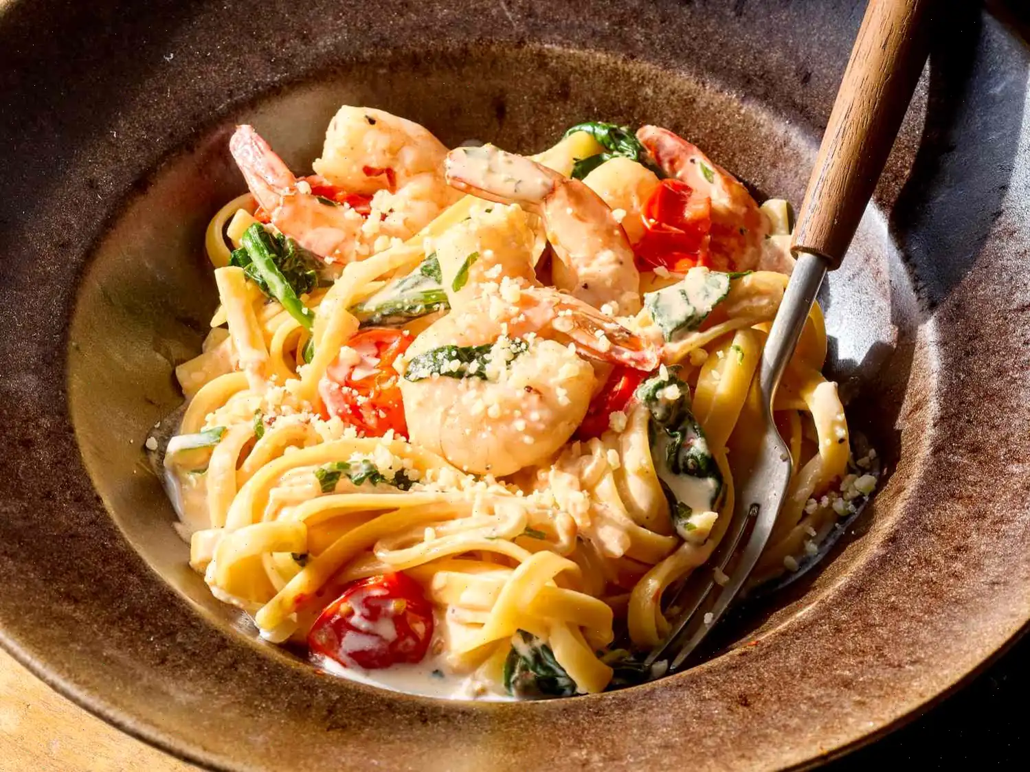 Fettuccine with Shrimp, Tomatoes, and Spinach Cream Sauce Recipe