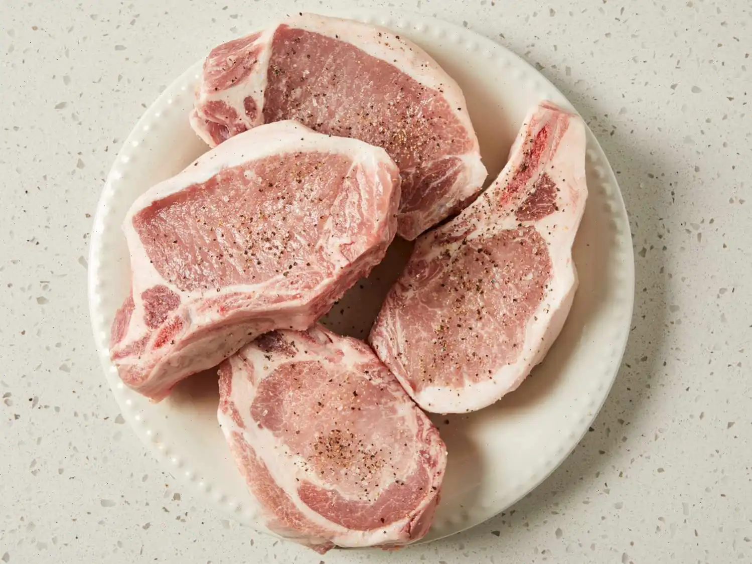 Pressure Cooker Bone-In Pork Chops, Baked Potatoes, and Carrots Recipe