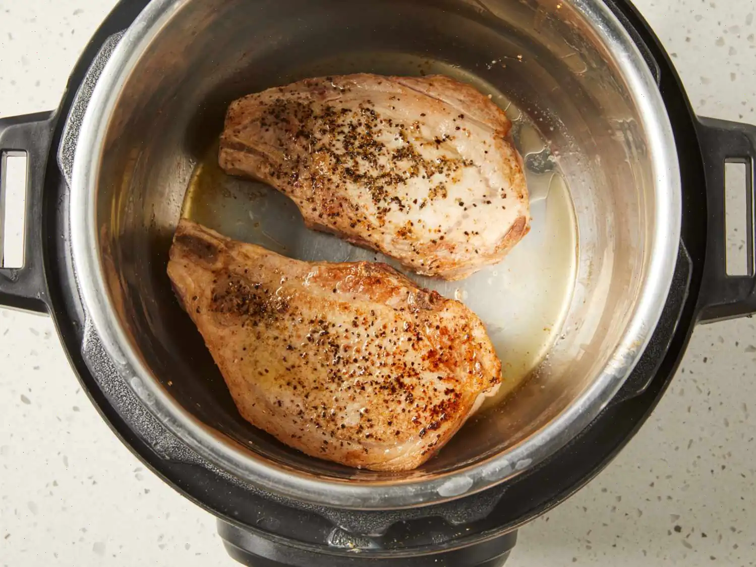 Pressure Cooker Bone-In Pork Chops, Baked Potatoes, and Carrots Recipe